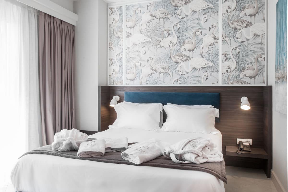 superior double room | premium bedding, minibar, in-room safe, blackout curtains