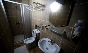 Shower, free toiletries, hair dryer, slippers