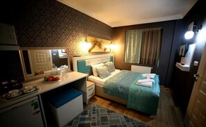 Kamar Standar | Wi-Fi gratis dan seprai linen