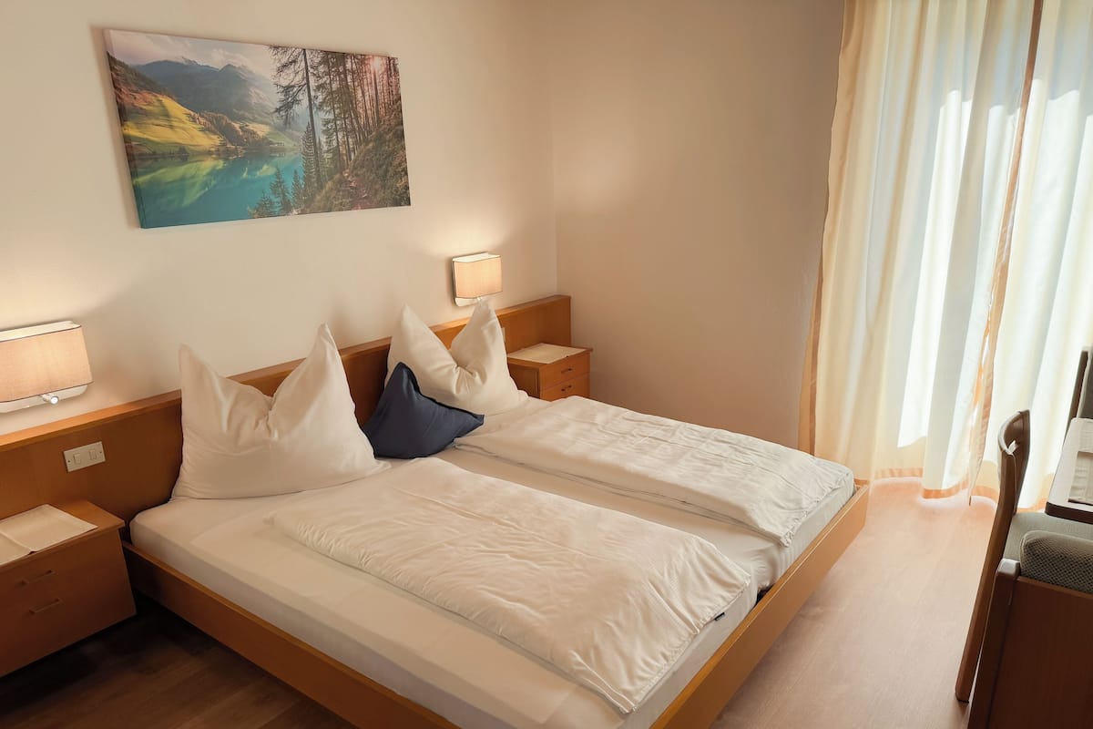Desk, blackout curtains, free WiFi, bed sheets