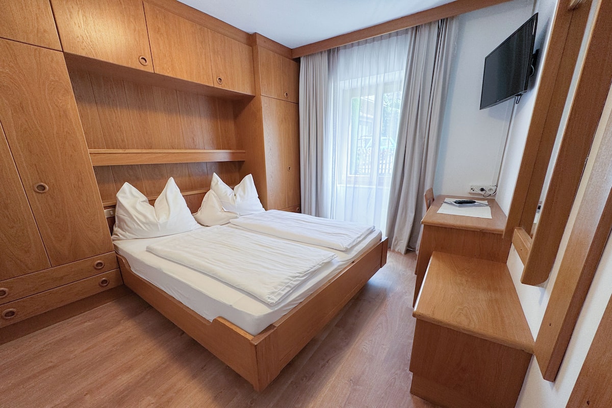 Desk, blackout curtains, free WiFi, bed sheets