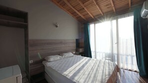 Standard Room | Living area | Flat-screen TV