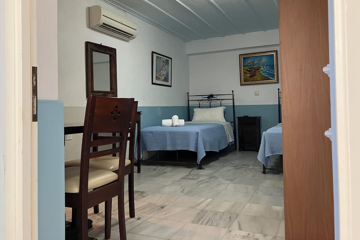 Two Single Beds with Courtyard View | 1 bedroom, soundproofing, iron/ironing board, free WiFi