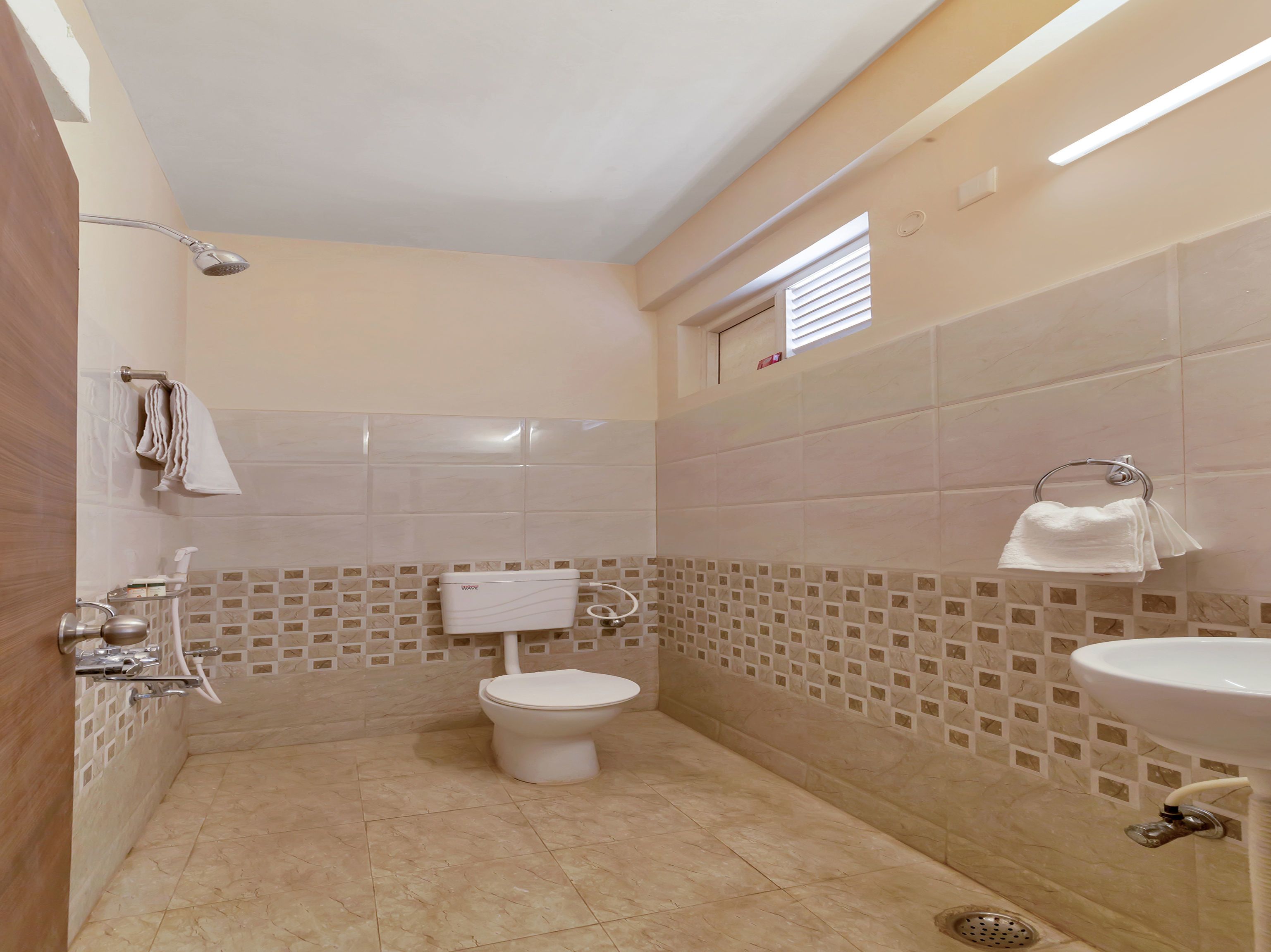 double or twin room | bathroom | shower, rainfall showerhead, free toiletries, towels