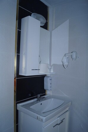 Free toiletries, hair dryer, slippers, towels