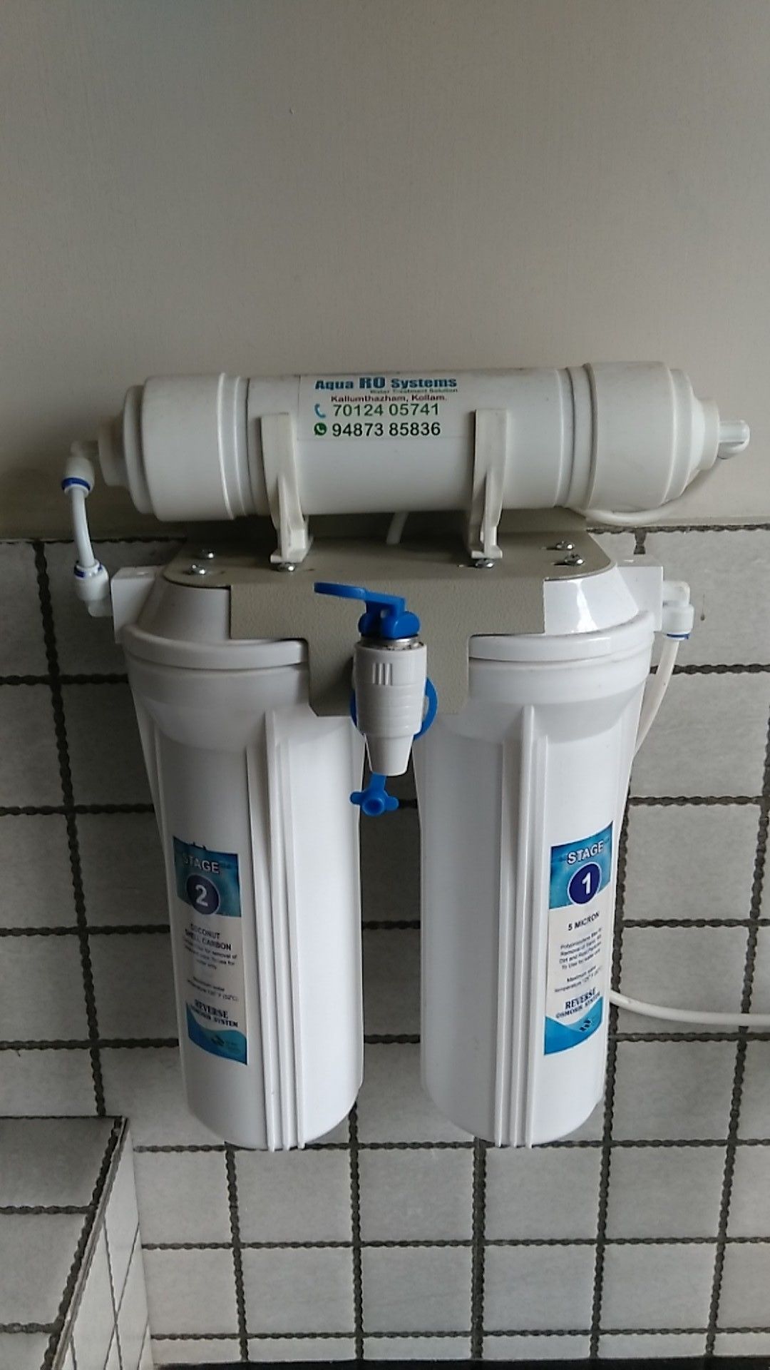 Two water filtration systems labeled "Aqua RO Systems" with contact information.