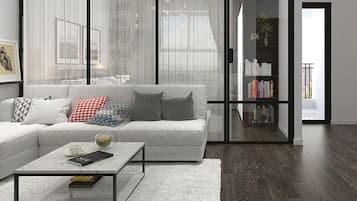 White Lotus Deluxe (City or Garden View) | Living room | 32-inch flat-screen TV with cable channels, TV