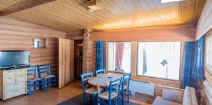 Cabin, 2 Bedrooms, Sauna | Living room | Flat-screen TV, fireplace - Ukonjärven Holiday Village (Inari)