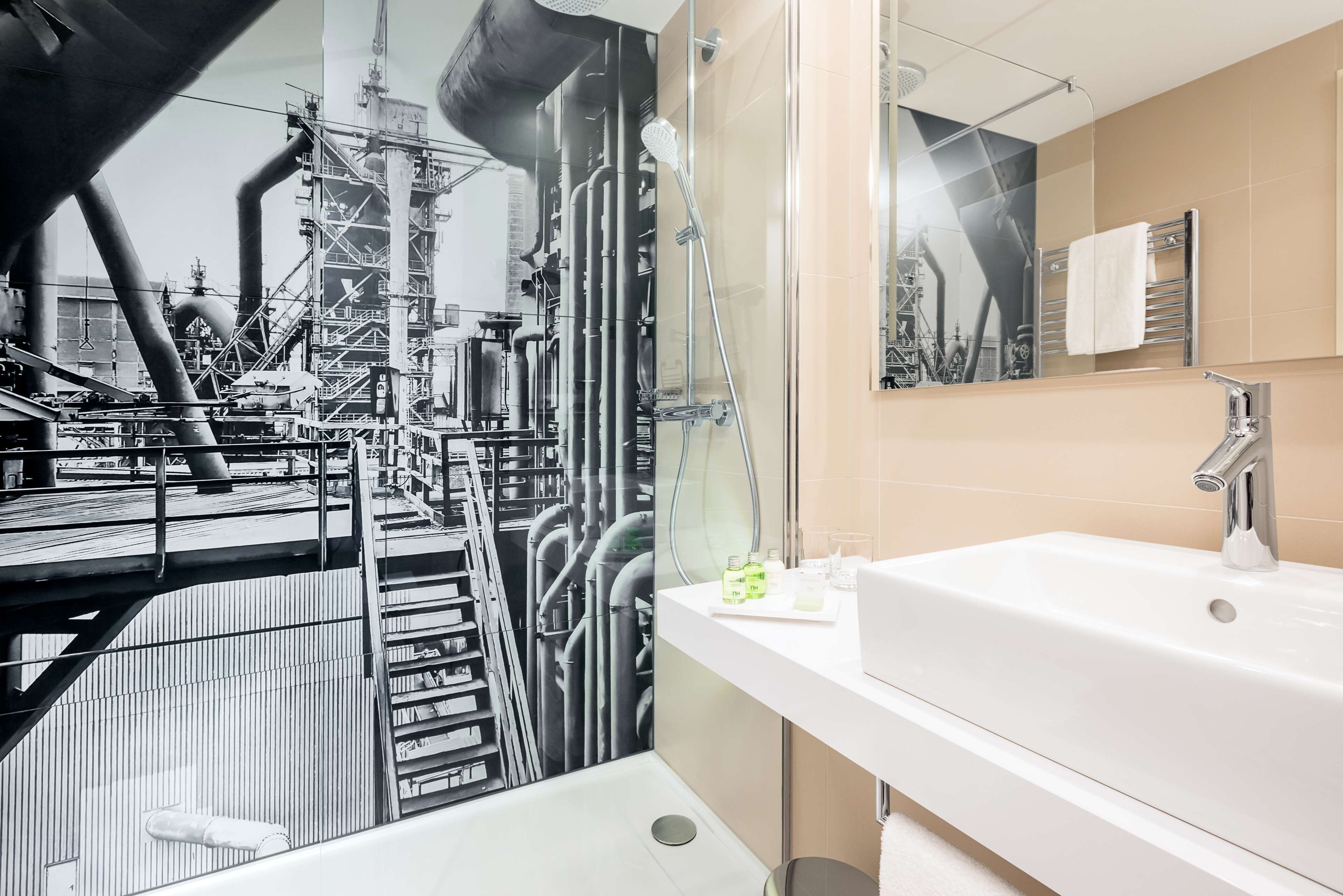 rainfall showerhead, eco-friendly toiletries, hair dryer, slippers