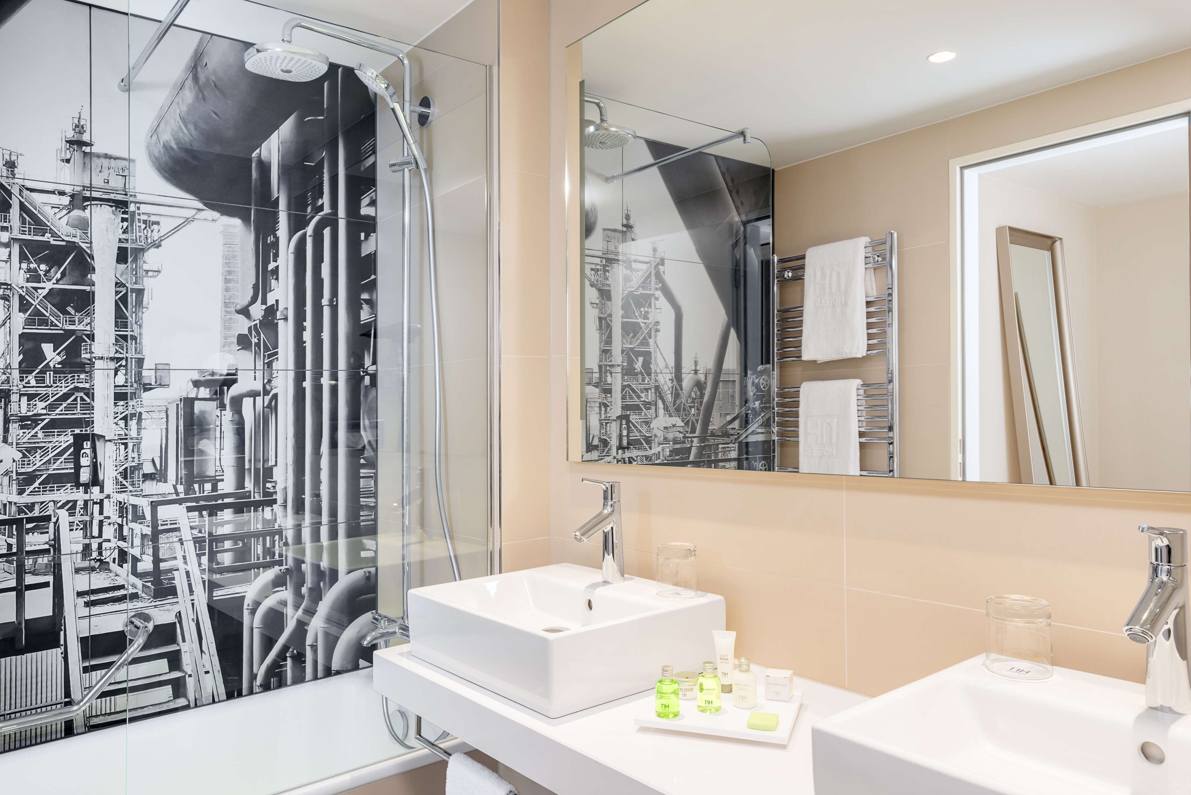 rainfall showerhead, eco-friendly toiletries, hair dryer, slippers