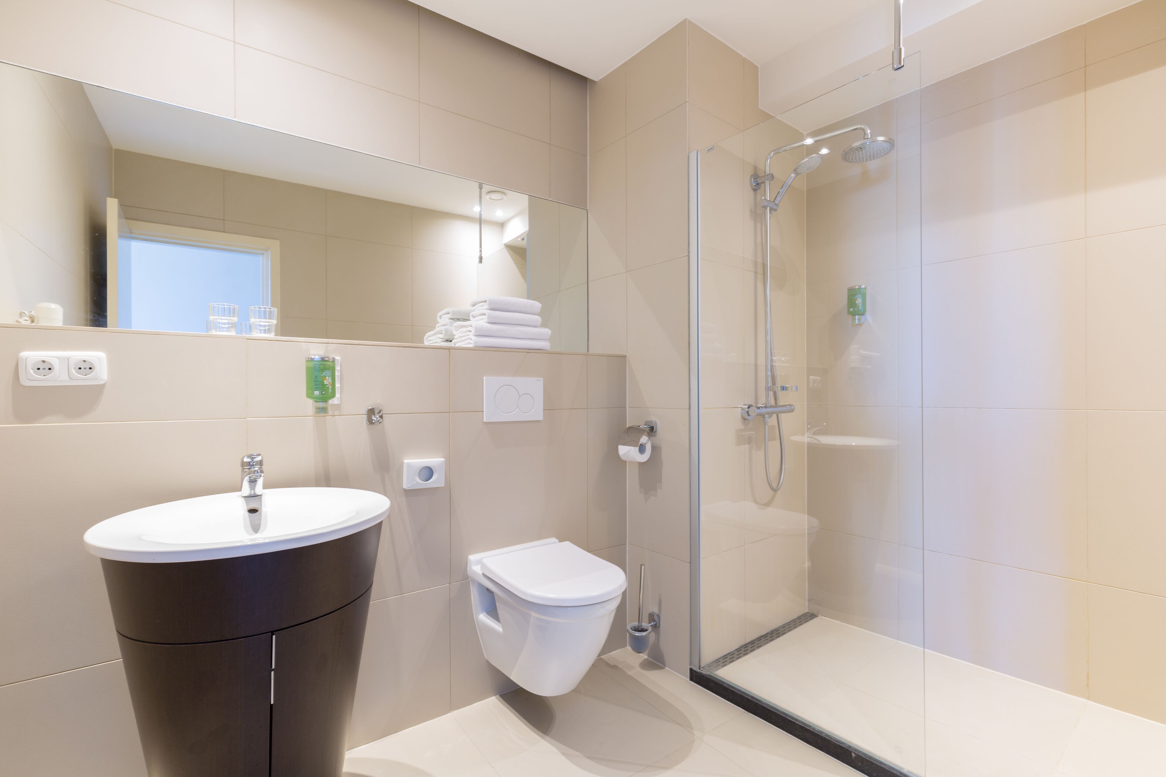 deluxe double room | bathroom | shower, eco-friendly toiletries, hair dryer, towels