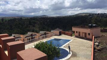 Outdoor pool, pool umbrellas, pool loungers