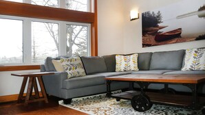 Family Townhome, 2 Bedrooms, Lake View, Overwater | Living room | Flat-screen TV, fireplace - Lakefront Cottage with Stunning Lakeview (Muskoka Lakes)