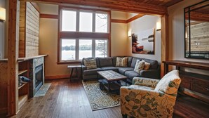 Family Townhome, 2 Bedrooms, Lake View, Overwater | Living room | Flat-screen TV, fireplace - Lakefront Cottage with Stunning Lakeview (Muskoka Lakes)