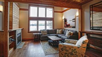 Family Townhome, 2 Bedrooms, Lake View, Overwater | Living room | Flat-screen TV, fireplace