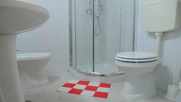 Standard Quadruple Room, Balcony | Bathroom | Shower, rainfall showerhead, free toiletries, hair dryer