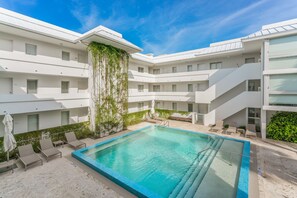Outdoor pool, pool umbrellas, pool loungers