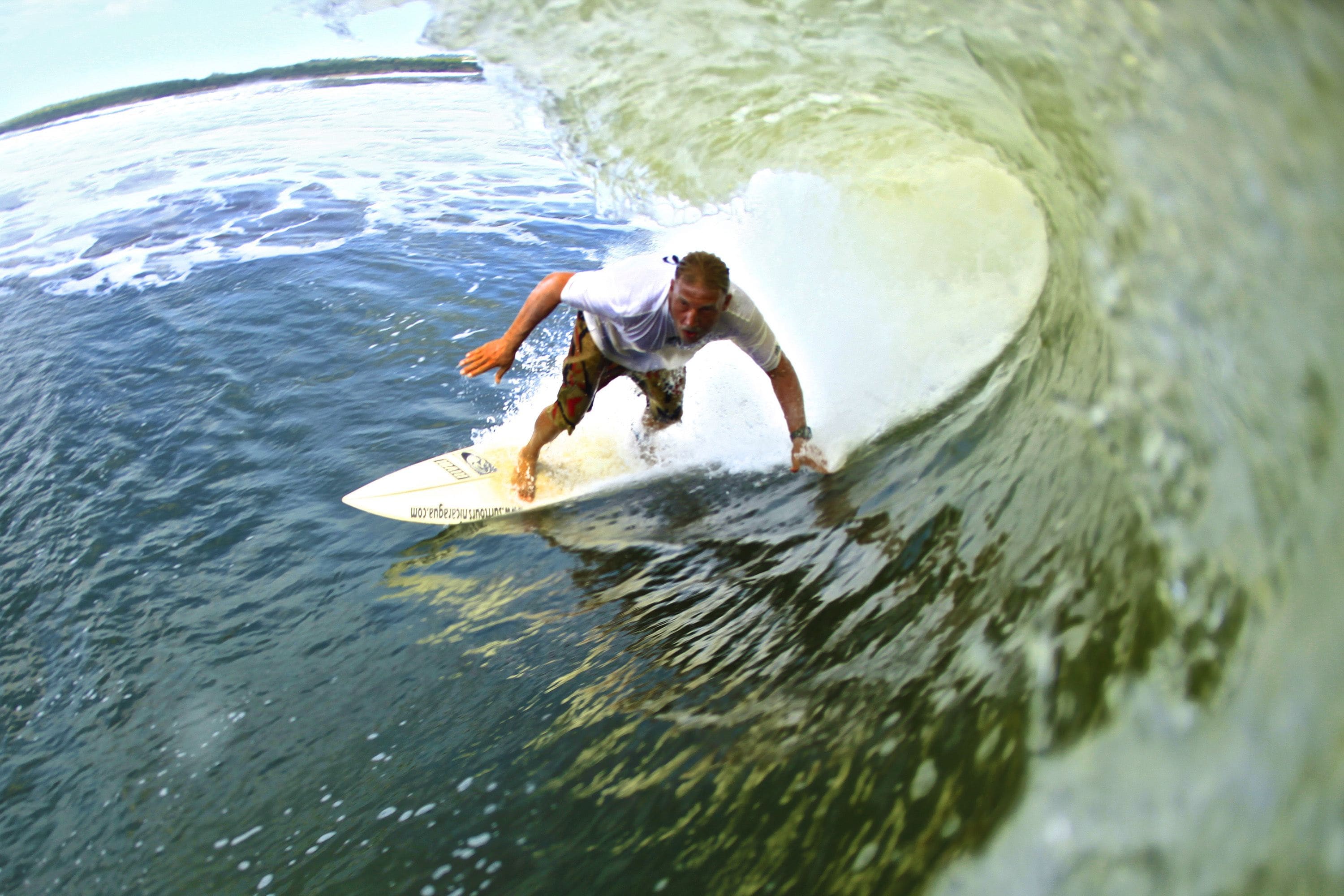 A person surfing a wave.