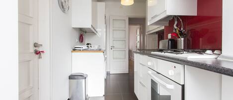 Apartment, 2 Bedrooms, Smoking, Balcony | Private kitchen | Full-size fridge, microwave, oven, stovetop