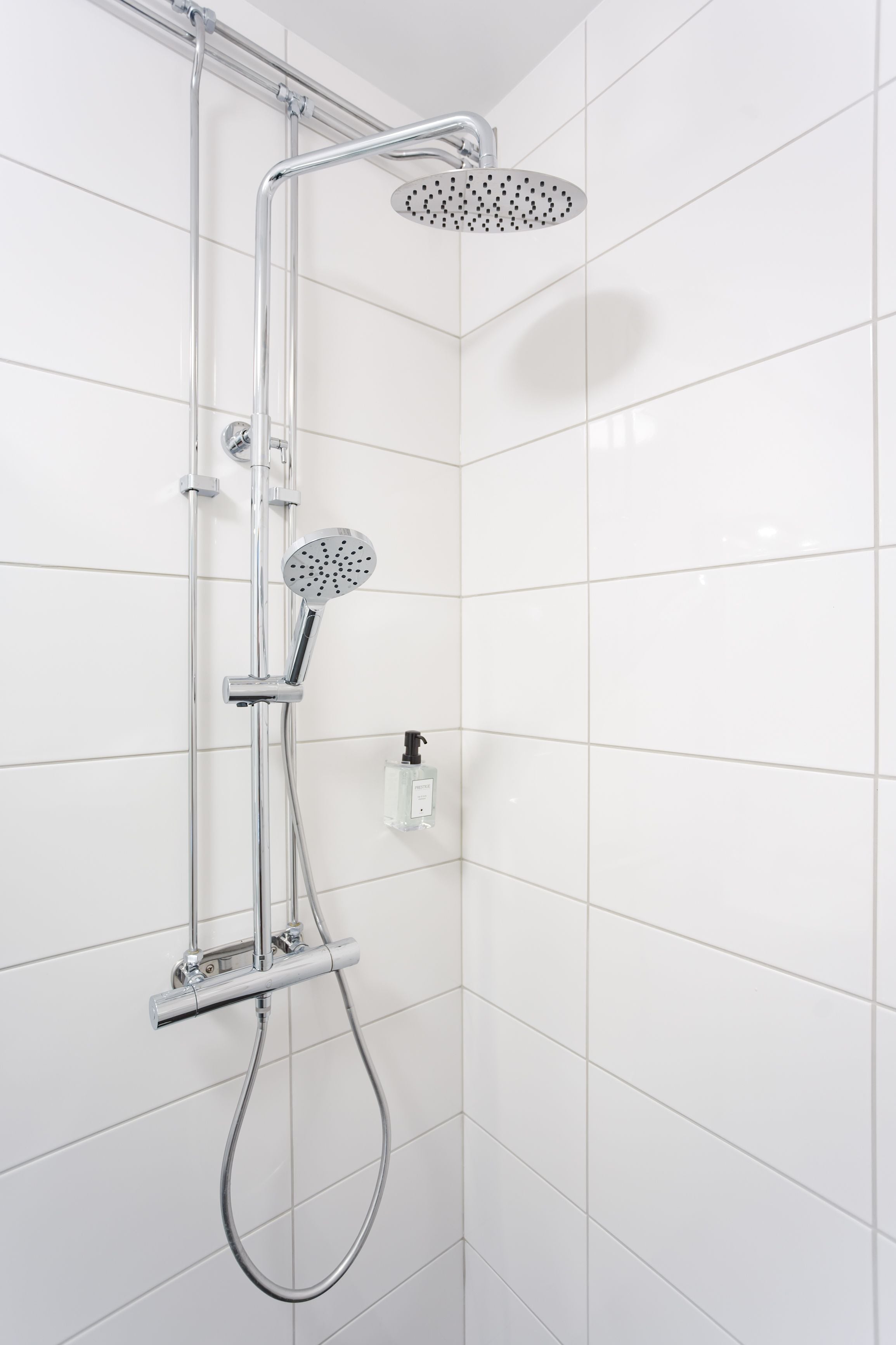 deluxe double or twin room | bathroom | shower, hair dryer, towels