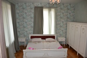 Family Apartment, 2 Bedrooms, Kitchen, Mountain View | 1 bedroom, minibar, desk, iron/ironing board - Dachi Inn (Kazbegi)