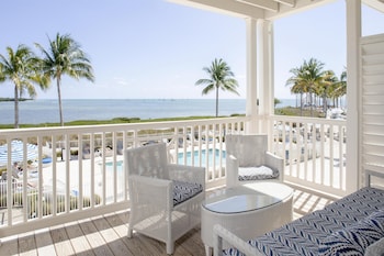 Hotel amenities such as safe, desk and work area at Isla Bella Beach Resort & Spa
