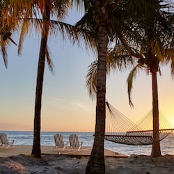 On the beach, sun loungers, beach umbrellas, beach towels