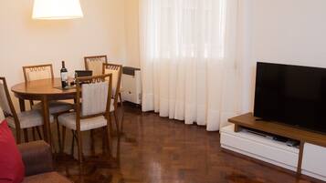 Superior Apartment, 2 Bedrooms | Living room | Flat-screen TV