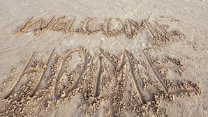 A beach with the words "WELCOME HOME" written in the sand. - FRONT ROW SEATS TO THE GULF OF Mexico! There's No Better View  TOTAL RENOVATION (Freeport)