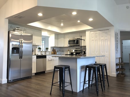 Fridge, microwave, oven, stovetop. Beautiful completely remodeled home across the street from Lake June!