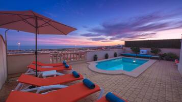 LĂ€mmitetty uima-allas