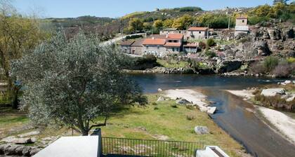 House of the Rivers Guard, on the river