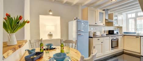 Fridge, microwave, oven, cookware/dishes/utensils