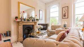 Smart TV, fireplace, books