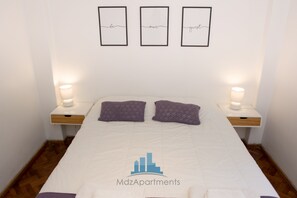 1 quarto, roupas de cama premium, cofres nos quartos