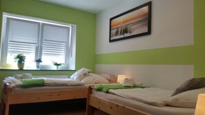 Blackout curtains, iron/ironing board, free cots/infant beds