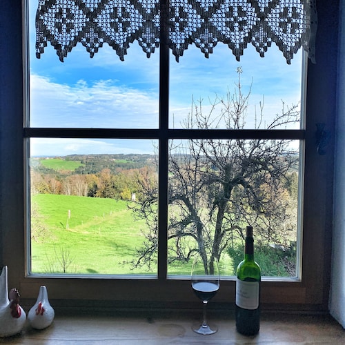 Vacation apartment with 2 separate bedrooms, living room with tiled stove, mountain view