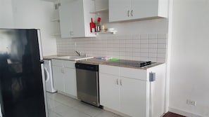 Fridge, stovetop, toaster, cookware/dishes/utensils