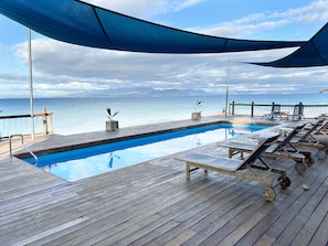 Outdoor pool, pool umbrellas, sun loungers