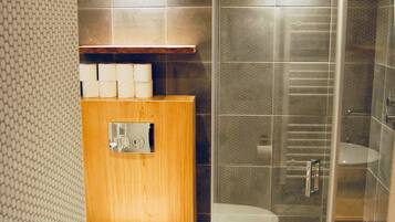 Shower, hair dryer, towels, soap