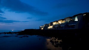 Front of property - evening/night - Hi Class Jeju (Jeju City)