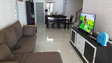 4-Bedroom Villa | Living area | 40-inch flat-screen TV with satellite channels, TV