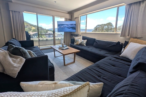 12 Share Superior Deluxe B 4 Bedroom | Living room | 50-inch Smart TV with satellite channels