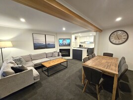 8 Share Superior Deluxe Penthouse 4 Bedroom | Living area | 50-inch Smart TV with satellite channels