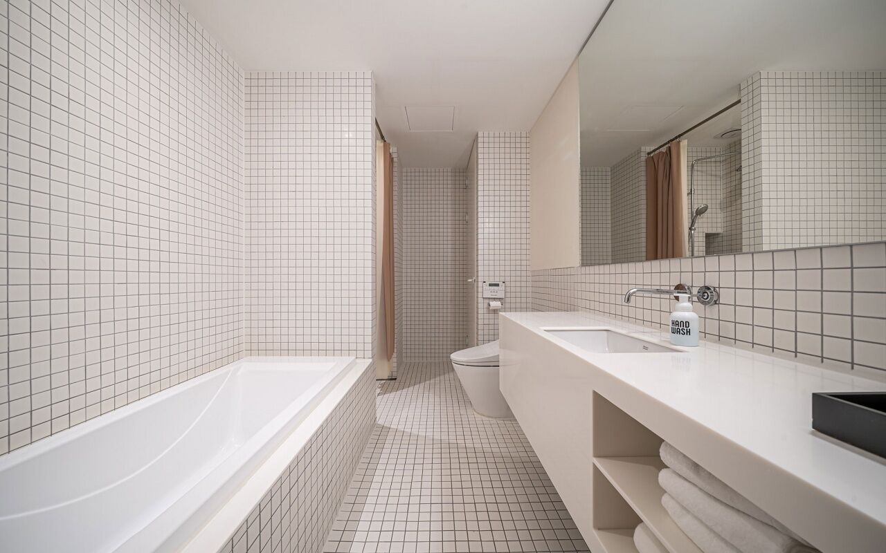 semi suite | bathroom | hair dryer, bathrobes, slippers, bidet