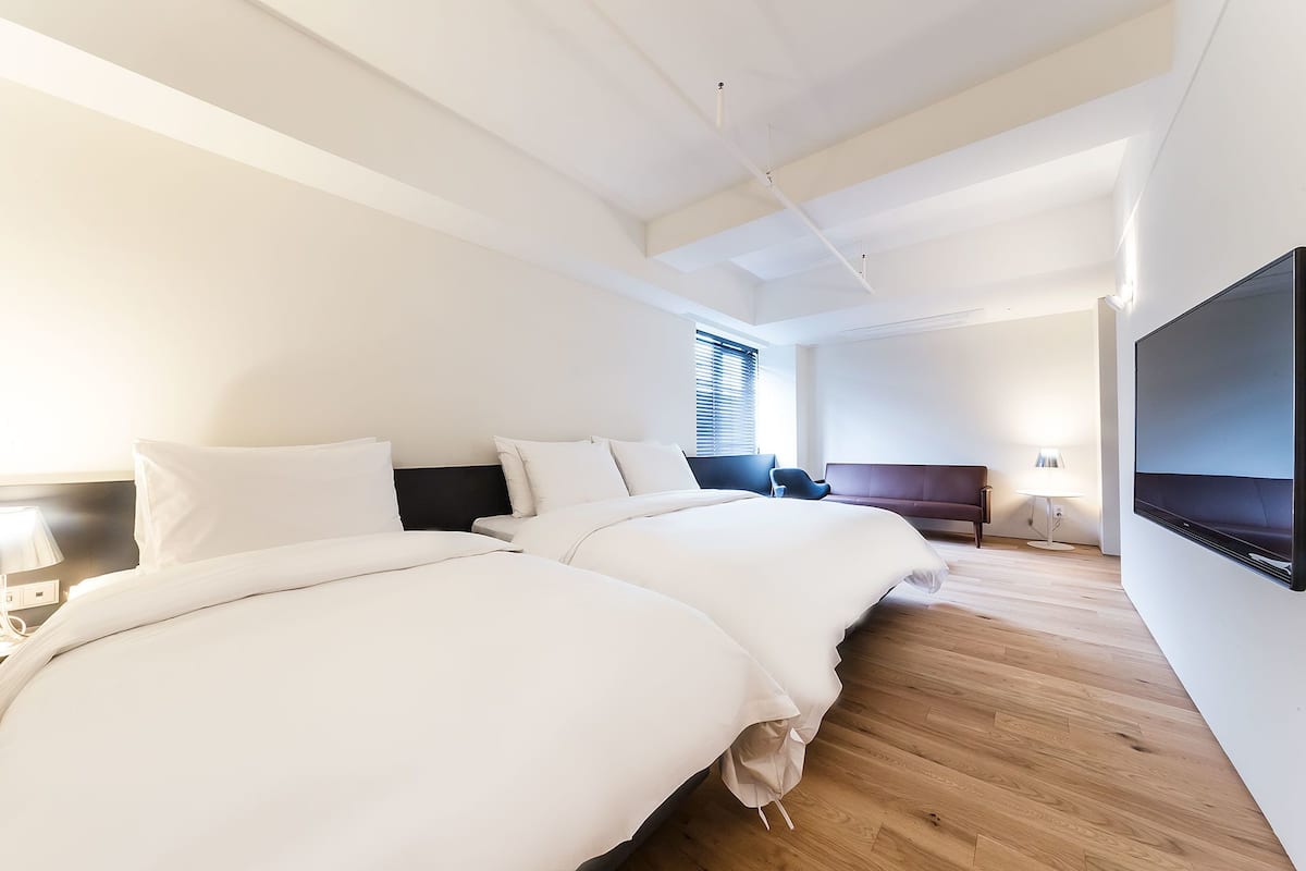 Blackout curtains, soundproofing, free WiFi, bed sheets