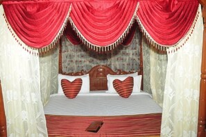 Family Room | 1 bedroom, in-room safe, iron/ironing board, free WiFi