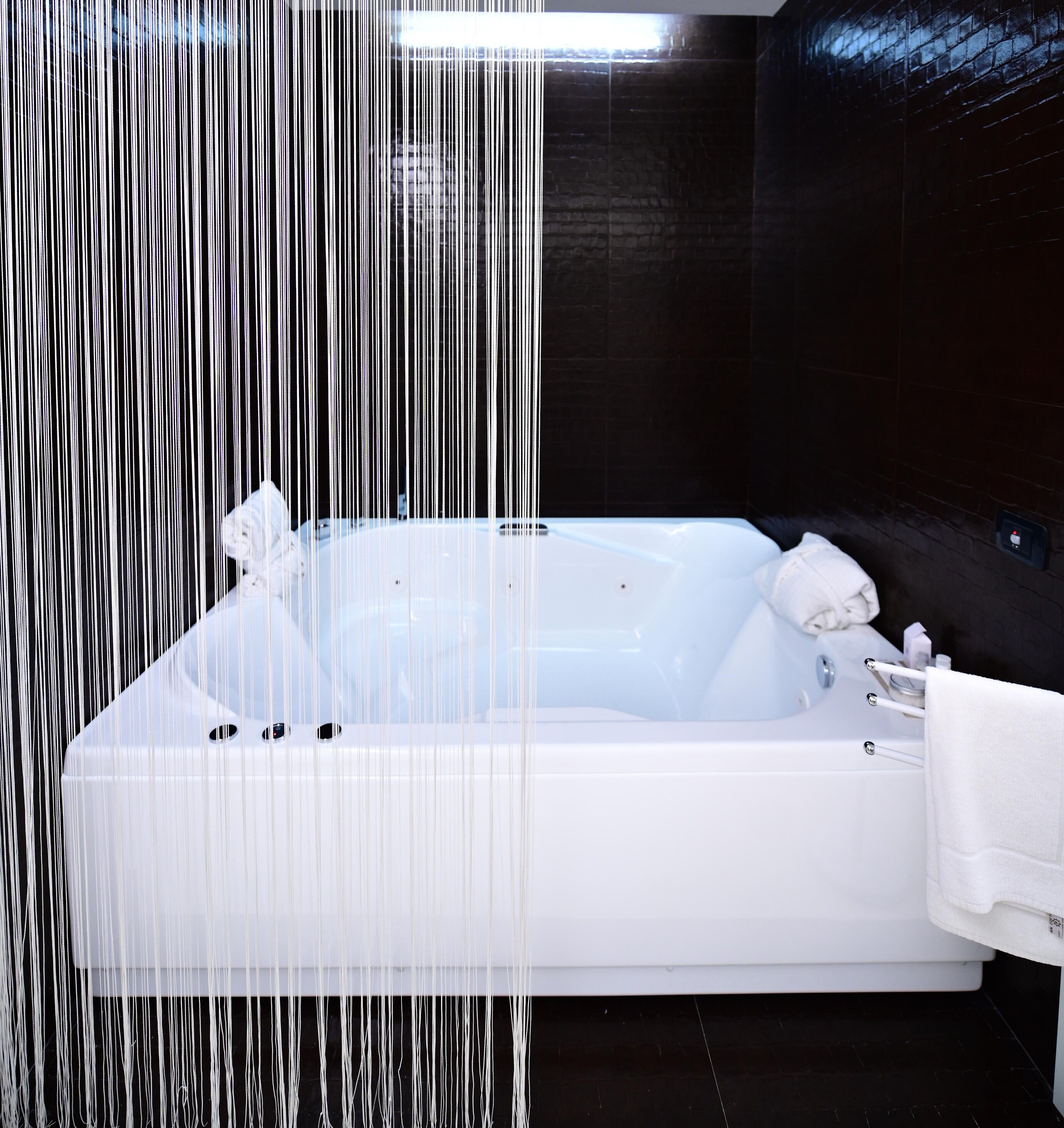 studio suite, hot tub | private spa tub