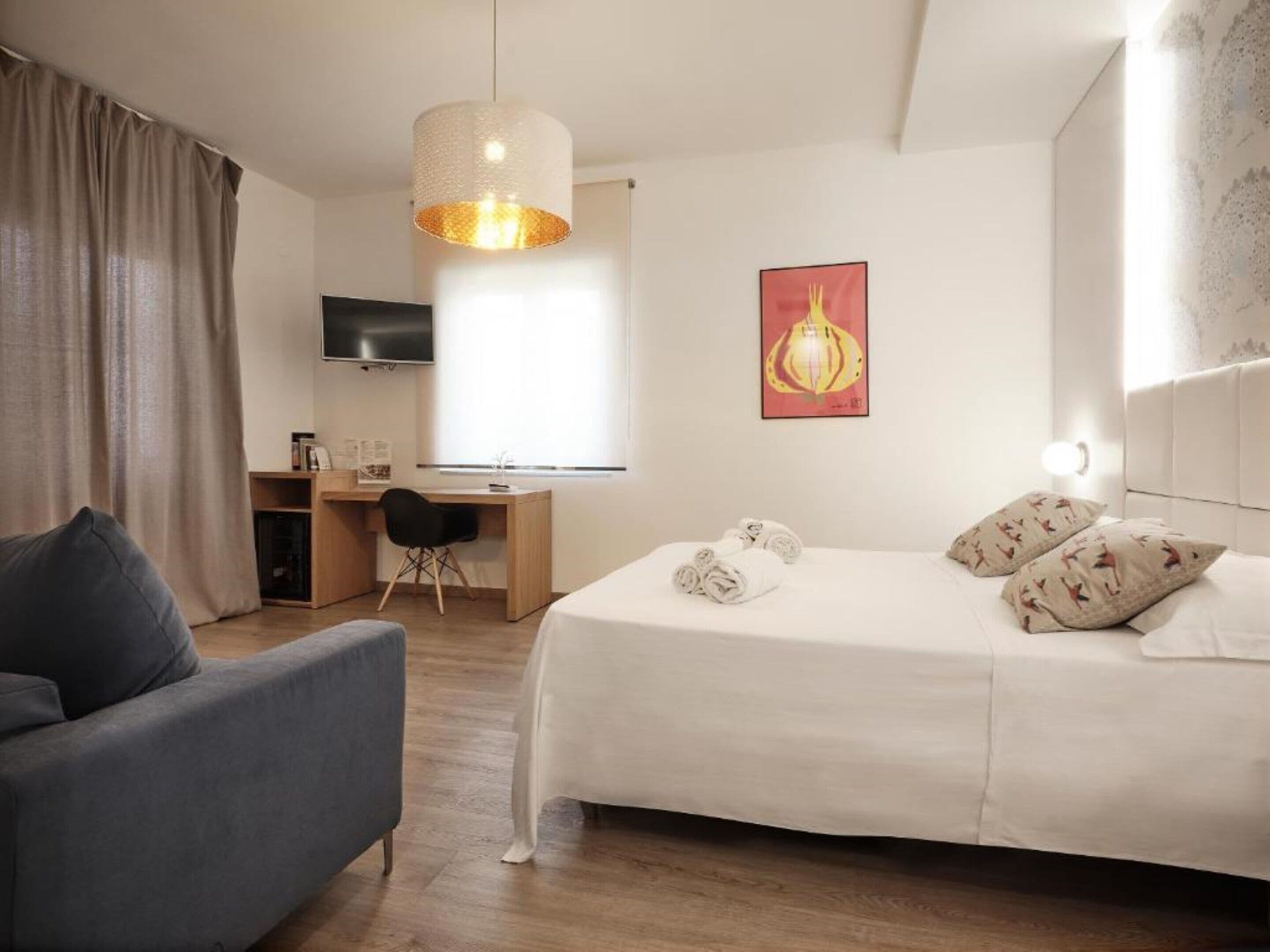 executive double room, garden area | in-room safe, desk, free wifi, bed sheets