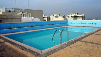 Outdoor pool, open 7 AM to 10 PM, sun loungers